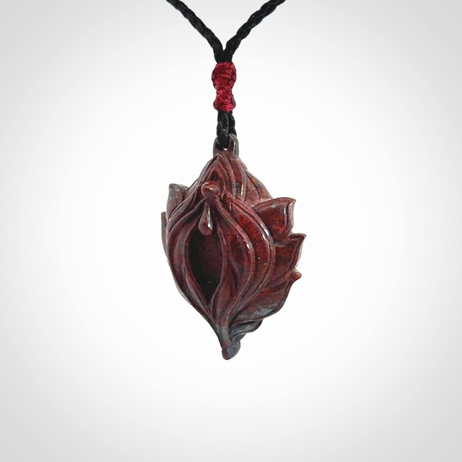 Hand carved jasper stone flower bud pendant