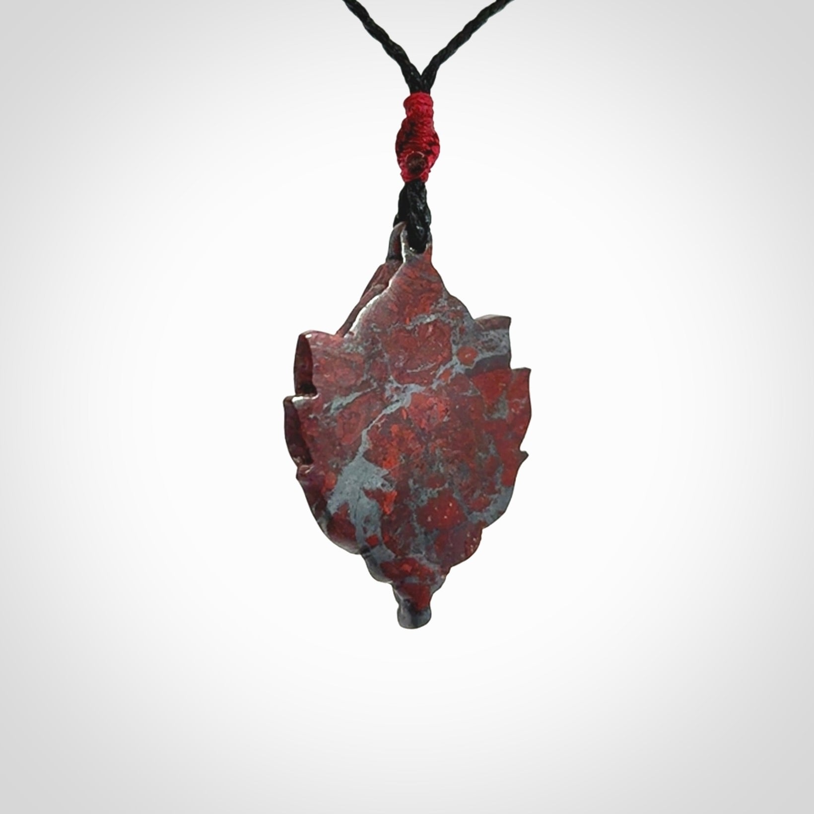 Hand carved jasper stone flower bud pendant