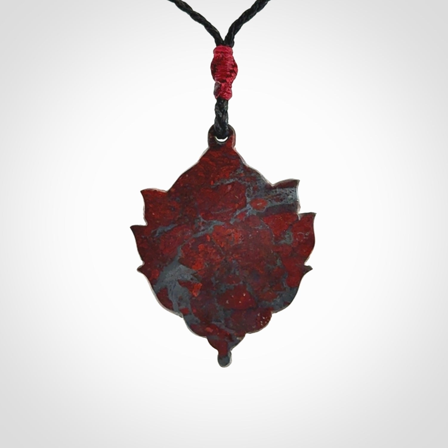 Hand carved jasper stone flower bud pendant