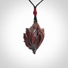 Hand carved jasper stone flower bud pendant