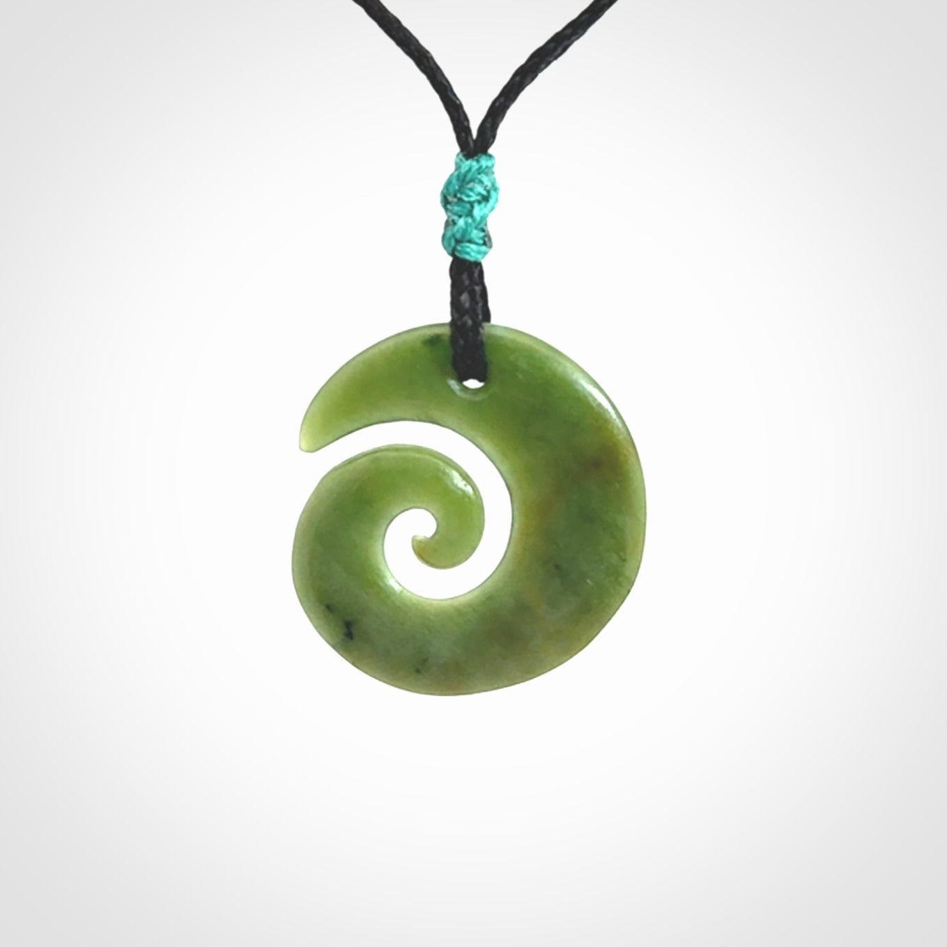 A Small Jade Koru Pendant to Wear on Your Adventures