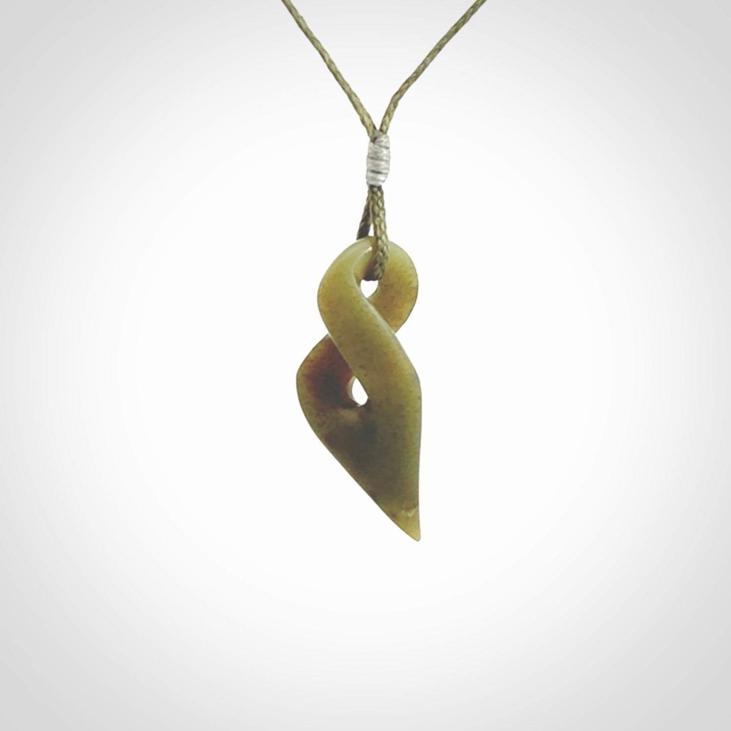 A Small New Zealand Jade Twist Pendant