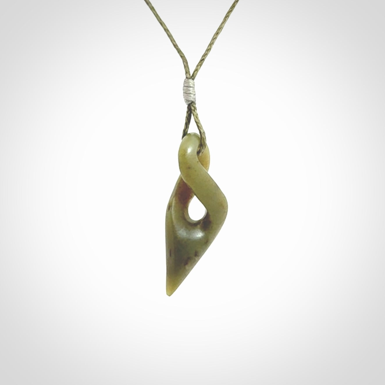 A Small New Zealand Jade Twist Pendant