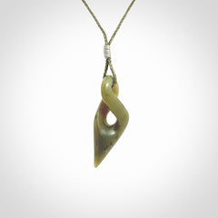 A Small New Zealand Jade Twist Pendant