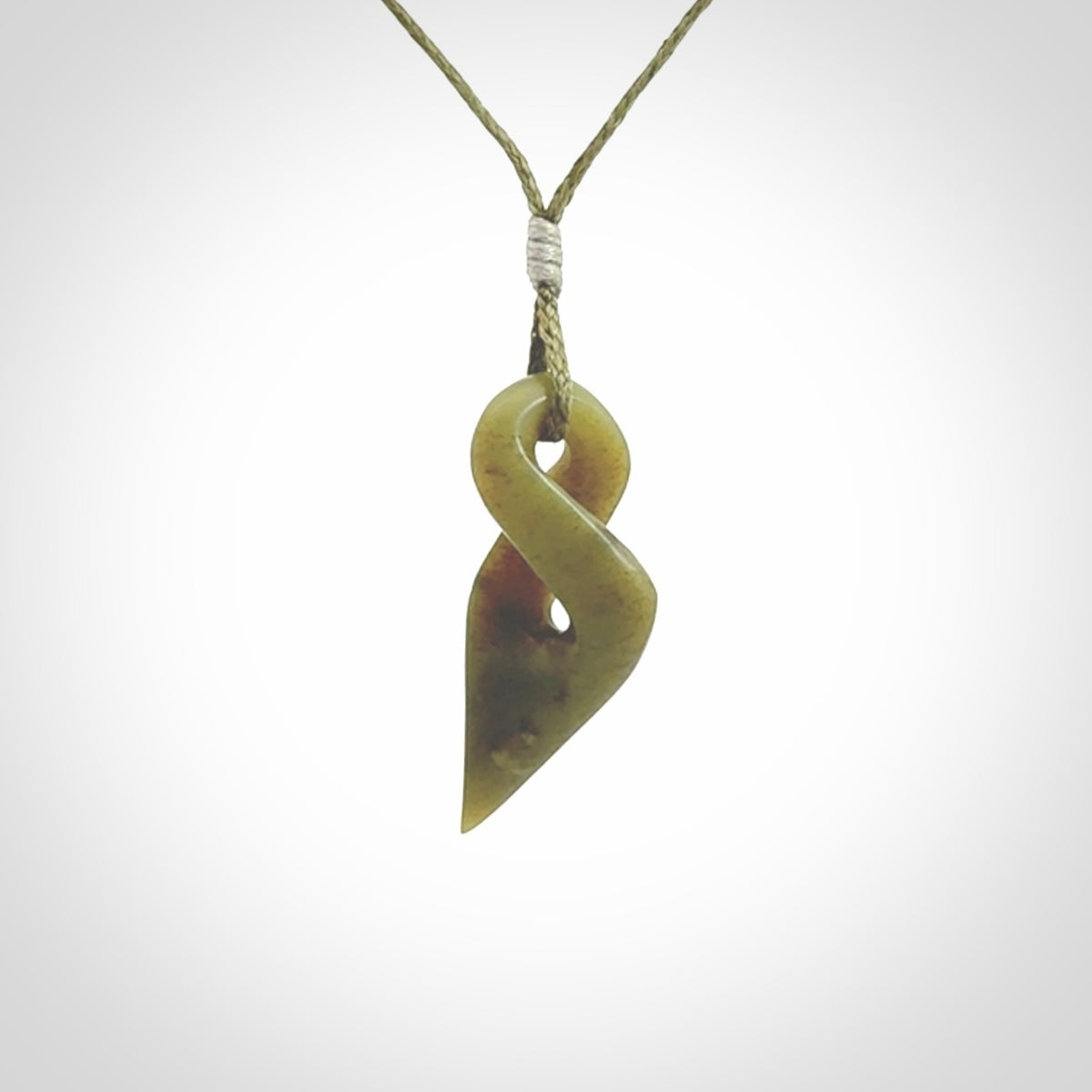 A Small New Zealand Jade Twist Pendant