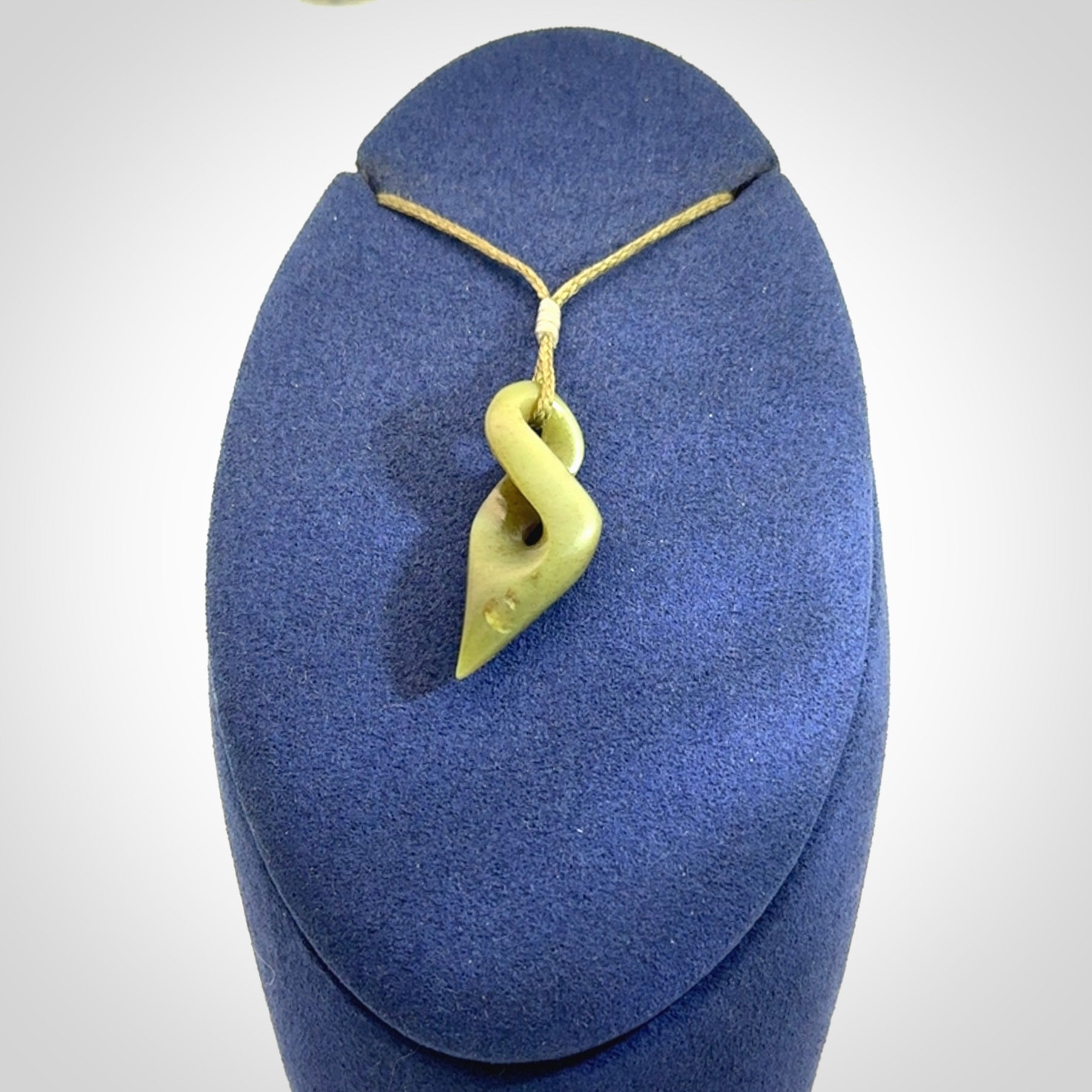 A Small New Zealand Jade Twist Pendant