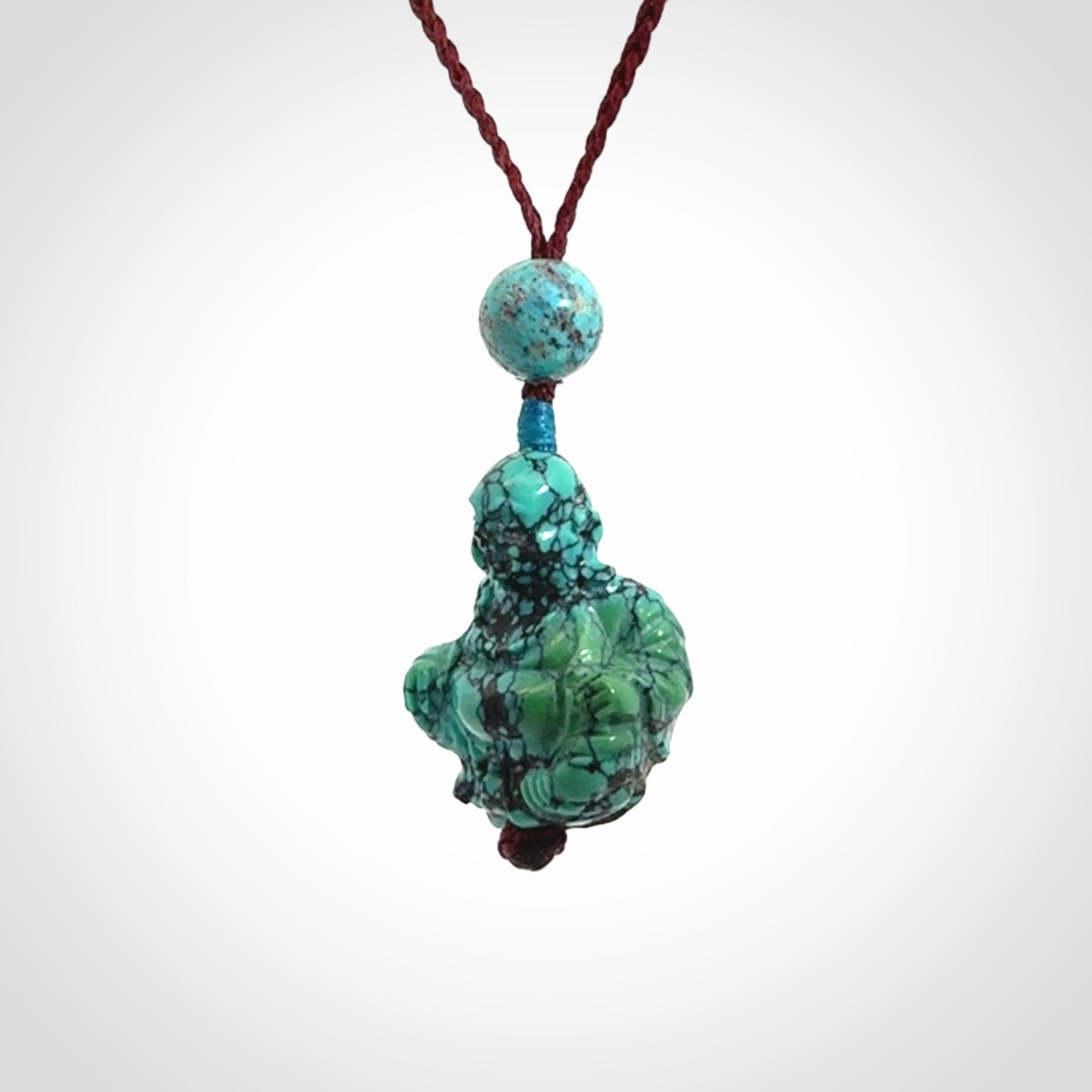 Hand Carved Meditating Buddha Pendant Carved in Turquoise
