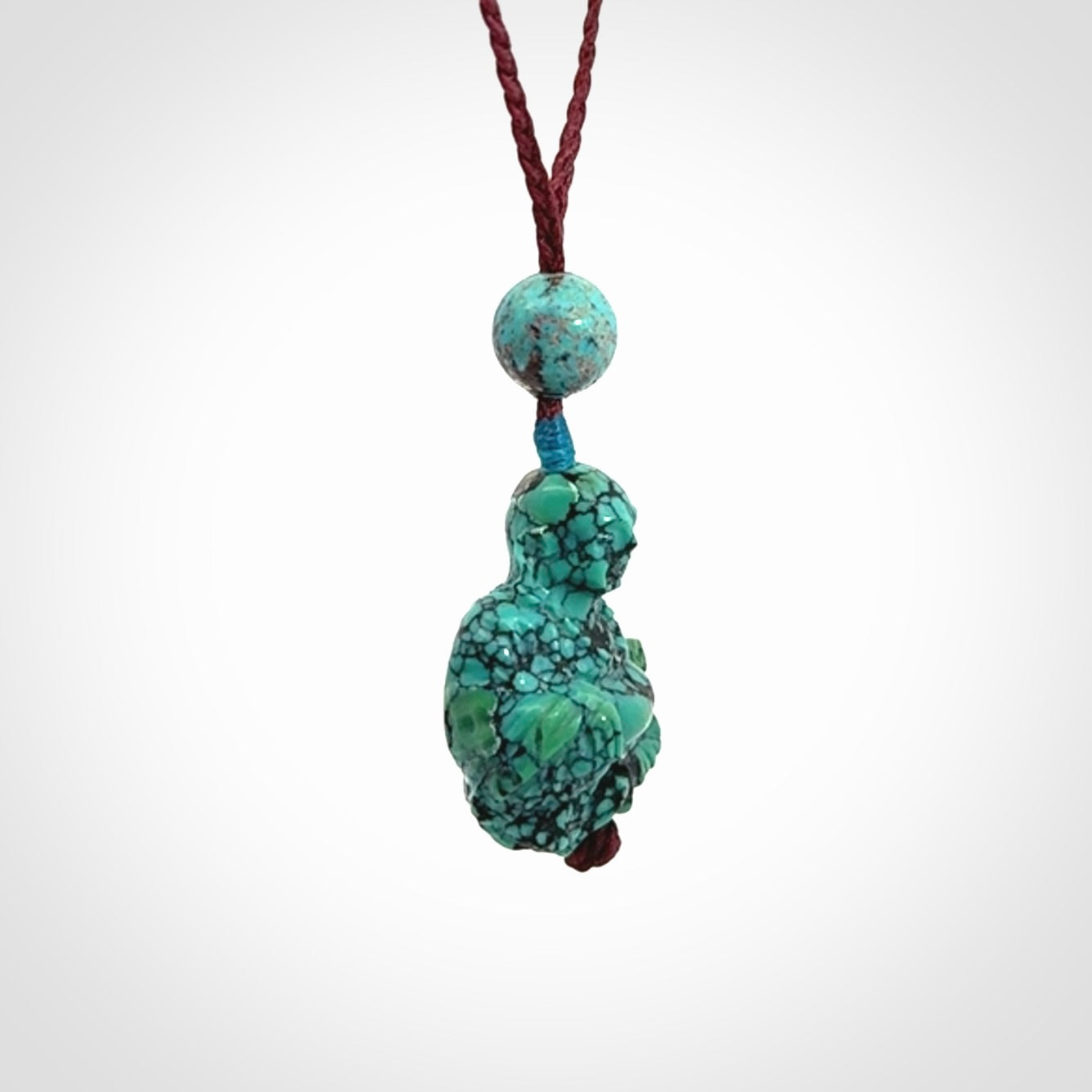 Hand Carved Meditating Buddha Pendant Carved in Turquoise