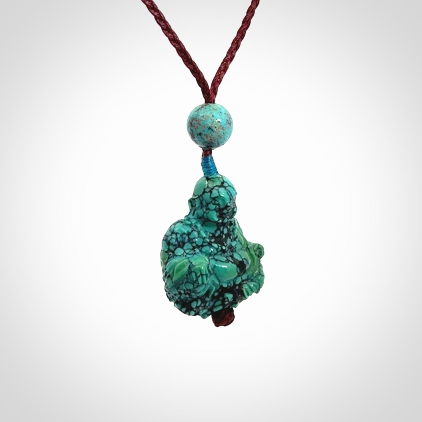 Hand Carved Meditating Buddha Pendant Carved in Turquoise