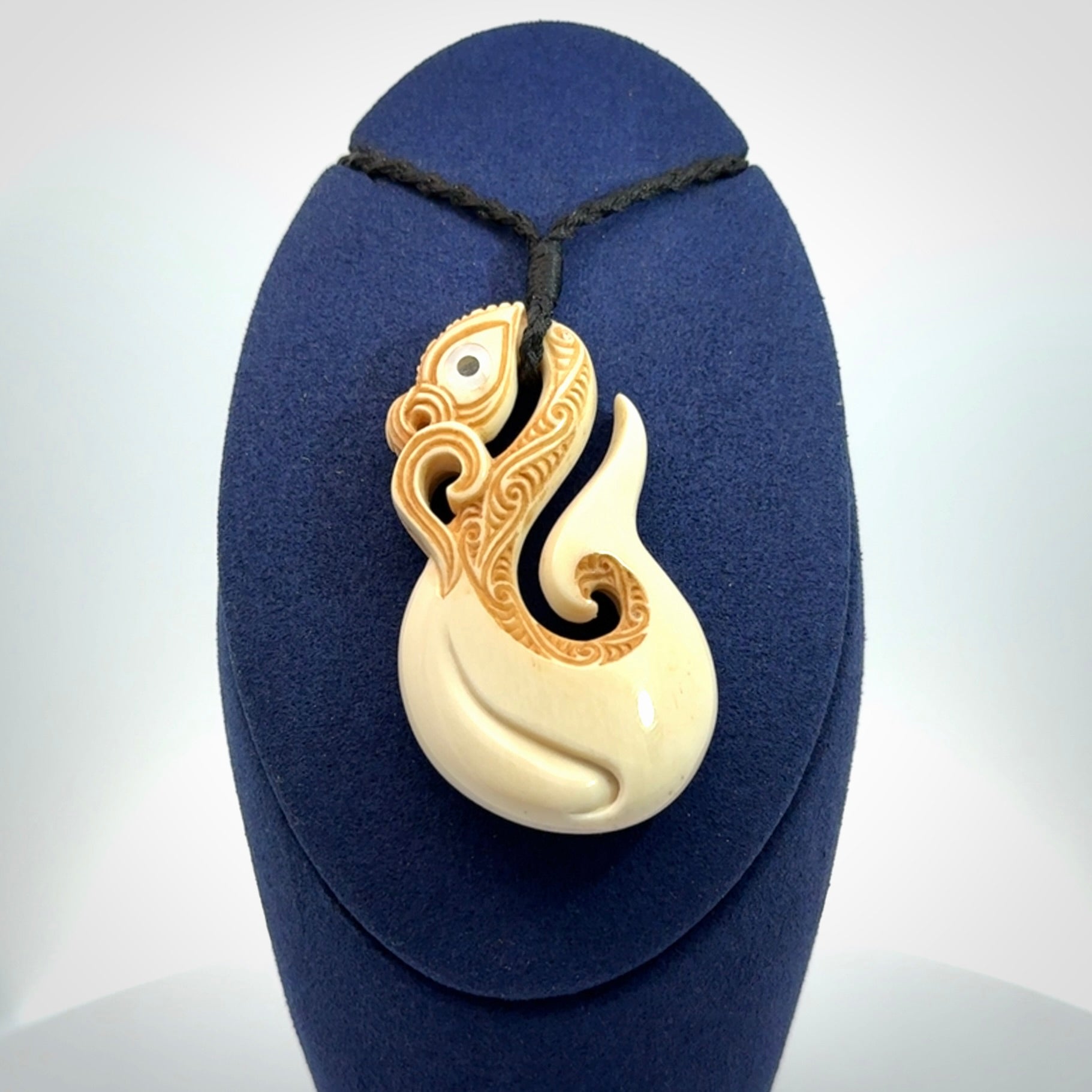 Hand carved bone manaia pendant
