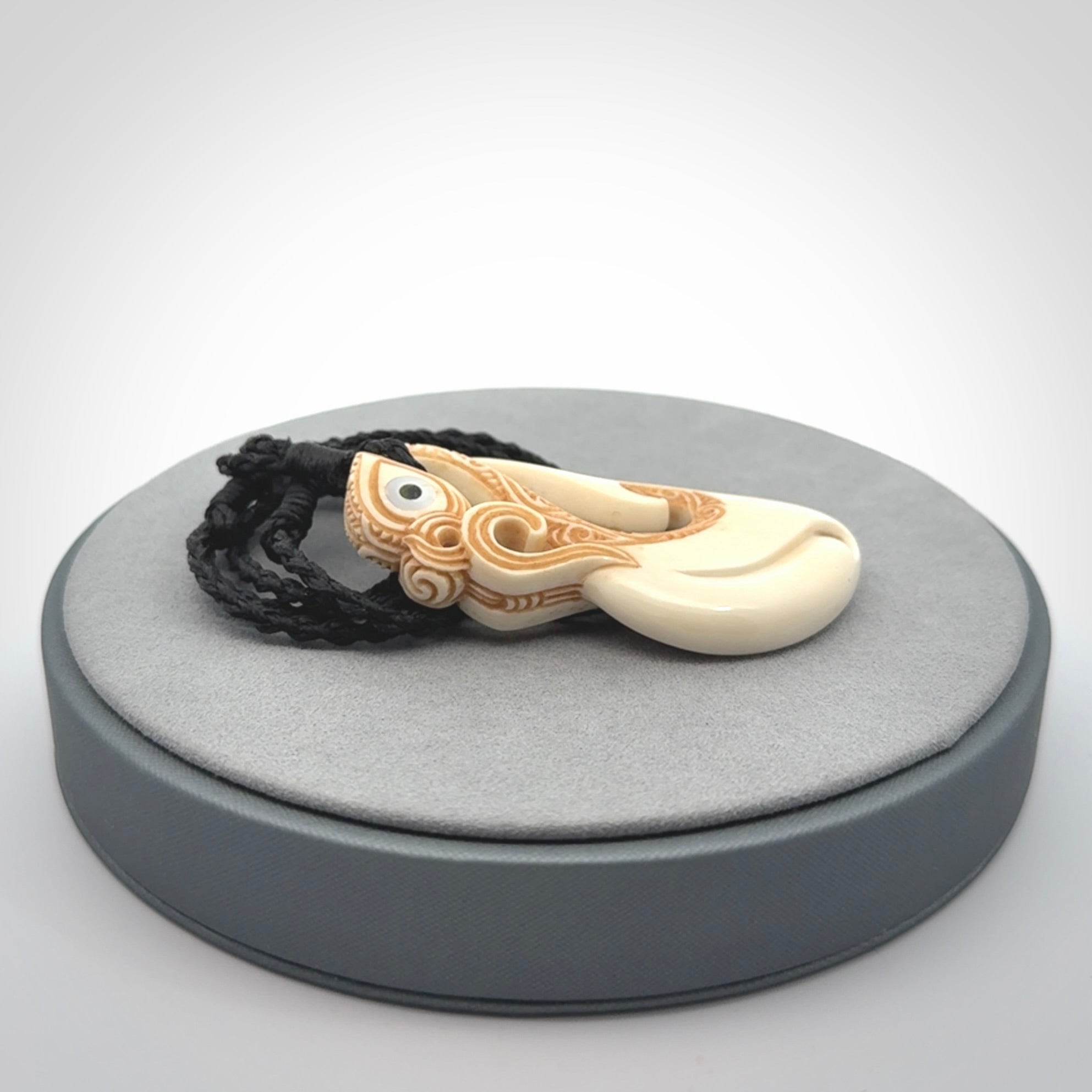 Hand carved bone manaia pendant