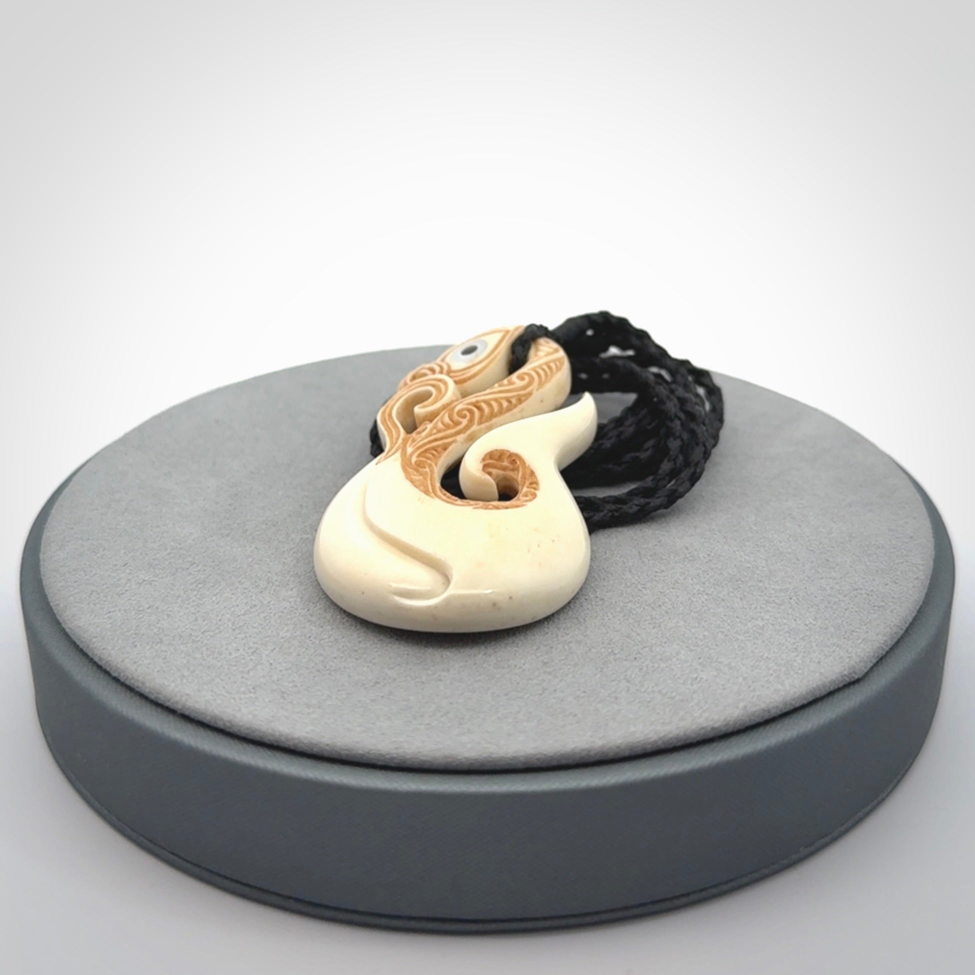 Hand carved bone manaia pendant