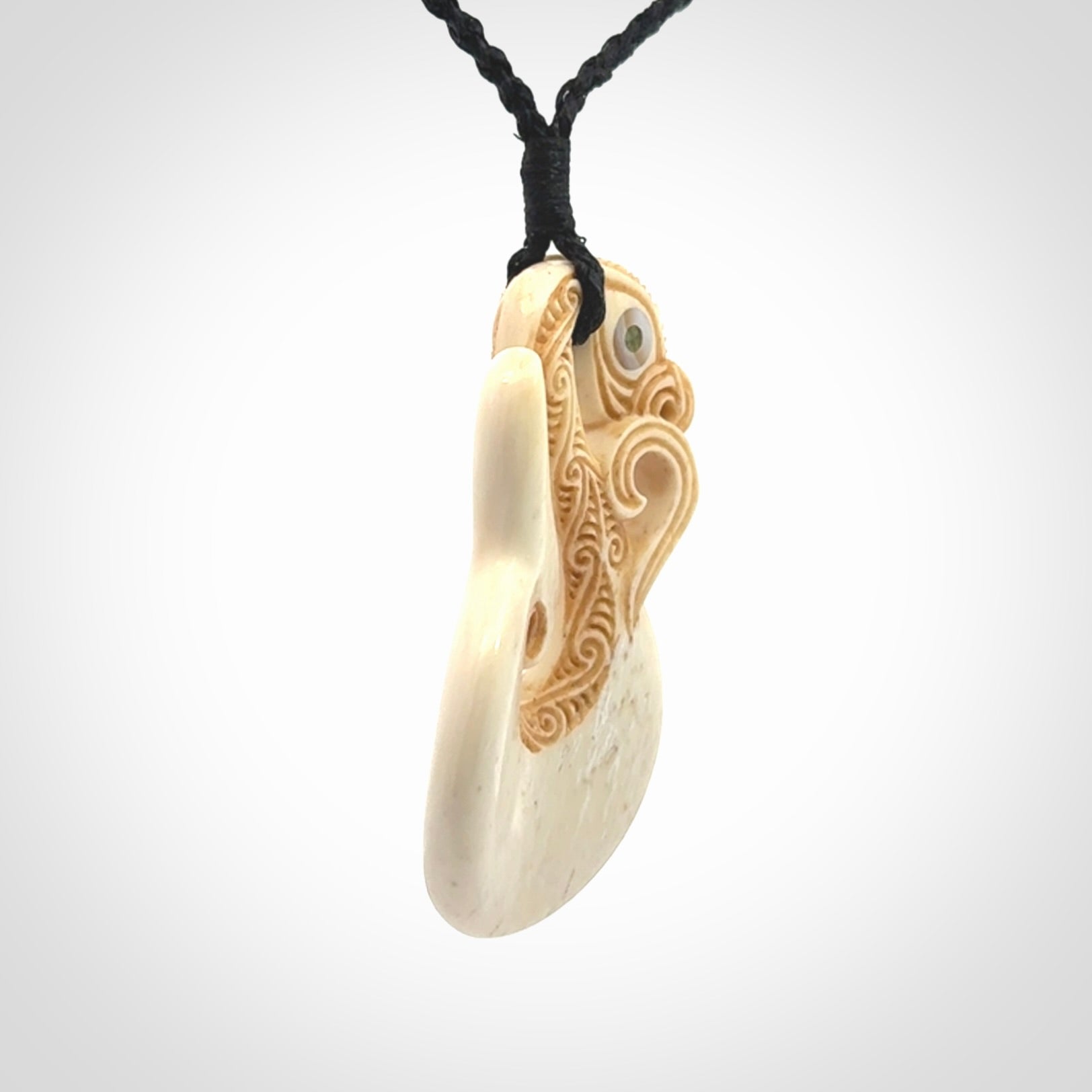 Hand carved bone manaia pendant