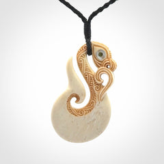 Hand carved bone manaia pendant