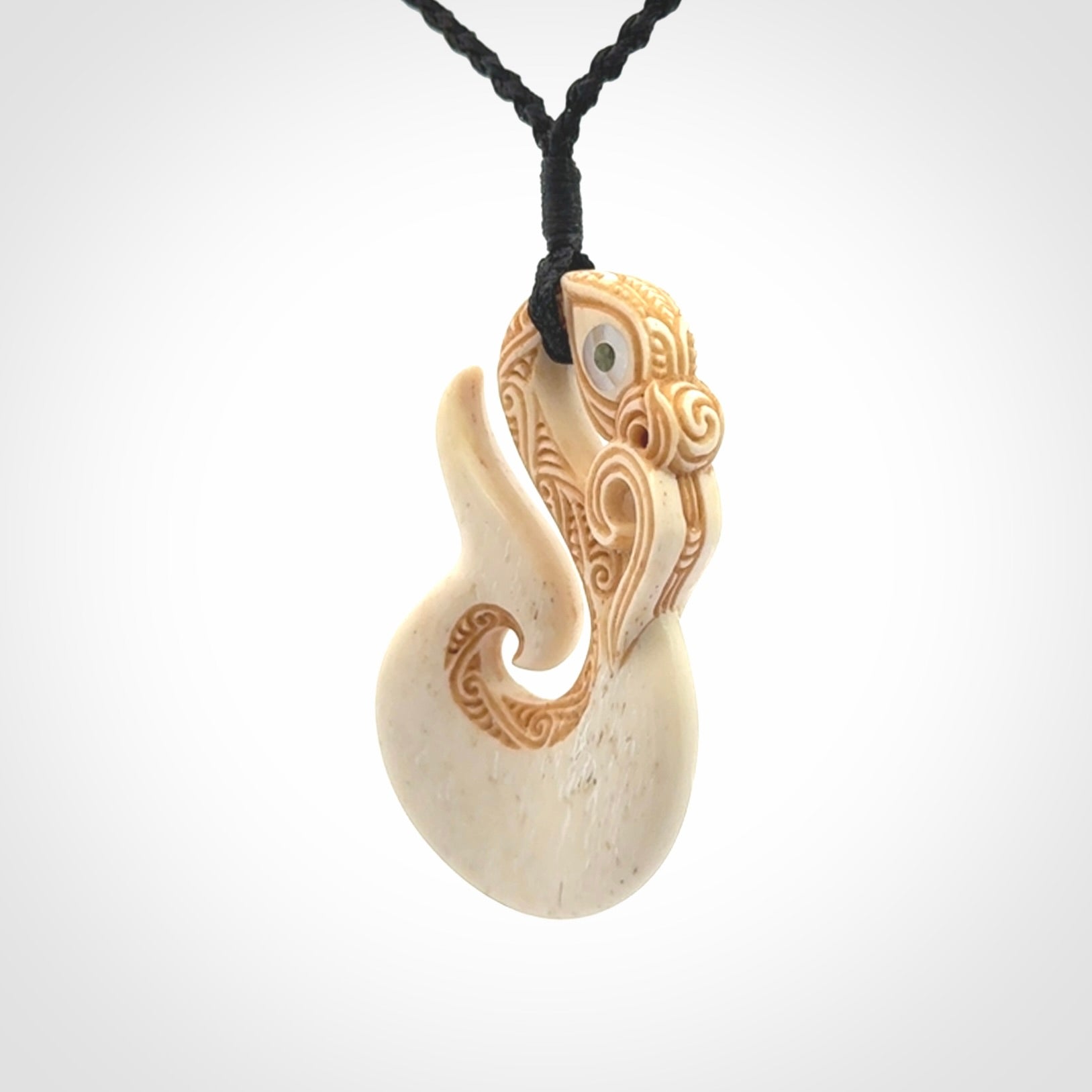 Hand carved bone manaia pendant