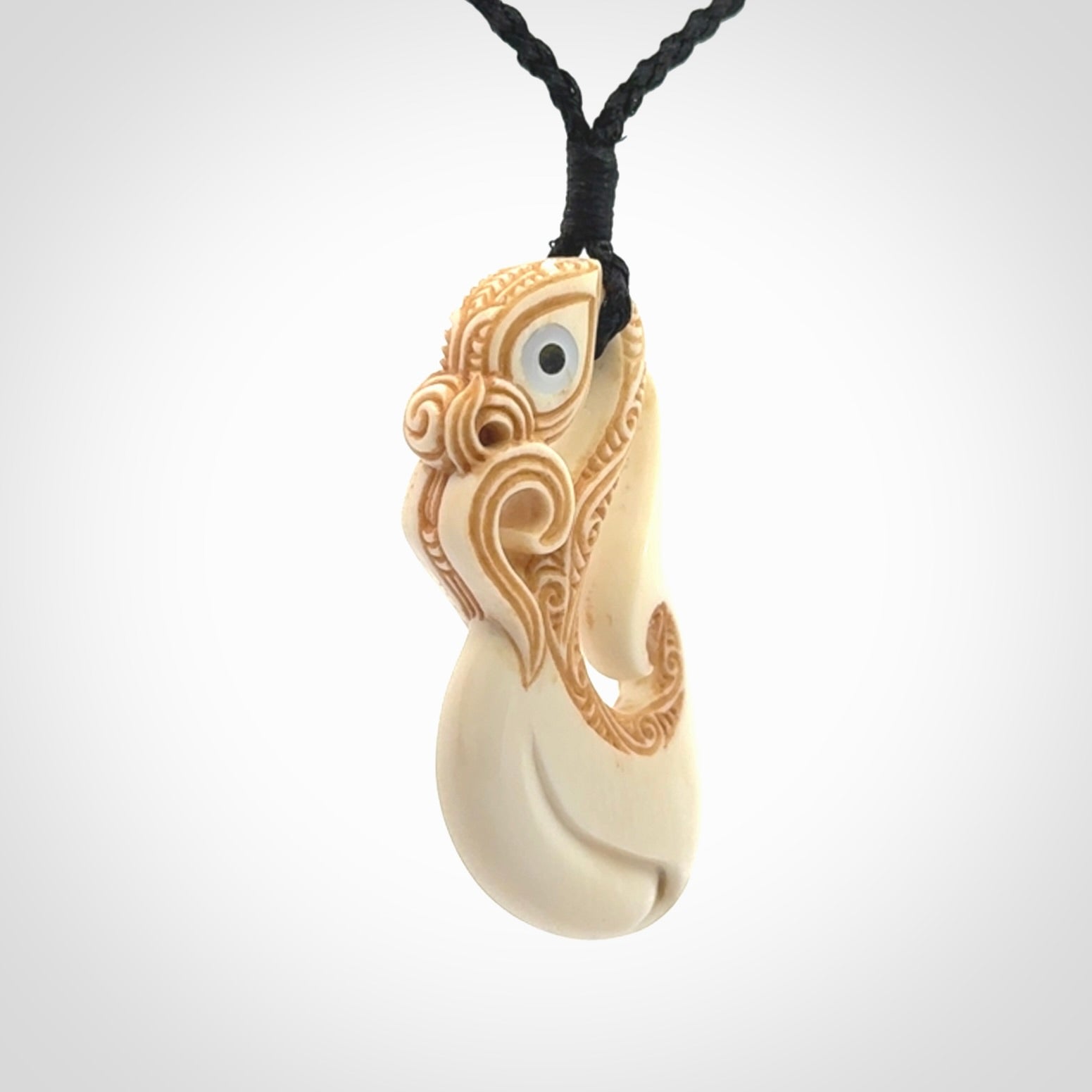 Hand carved bone manaia pendant
