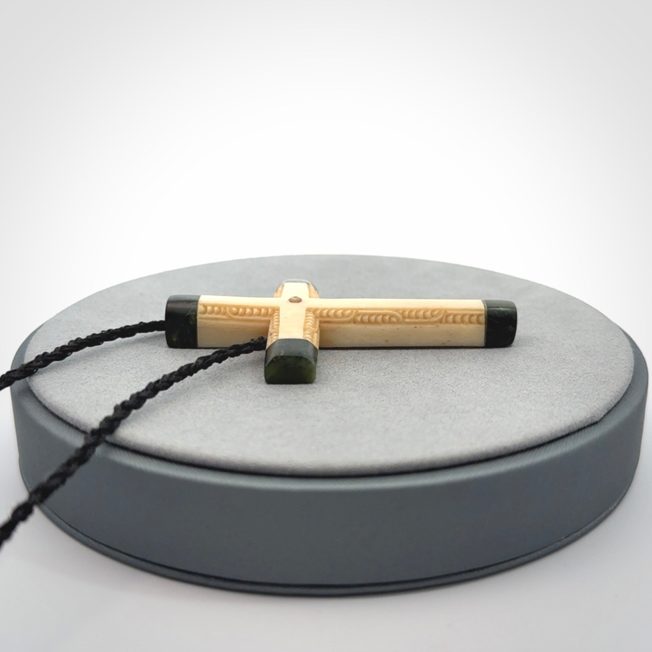 Hand made bone with jade cross pendant