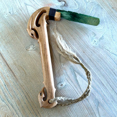 Hand carved large New Zealand Jade Toki Poutangata carving displayed in a New Zealand Flower Jade, Pounamu stand sculpture. Hand carved here in New Zealand by Kerry Thompson. This is a 'one only' sculpture, a beautiful display piece.