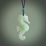 A hand carved Jadeite seahorse pendant. We have carved this from beautiful jadeite and we bind them with our hand-plaited cords. The cords are a waxed polyester so they are durable and strong. We ship these worldwide with express courier anywhere in the world.