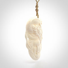 Hand carved bone woman dragon pendant