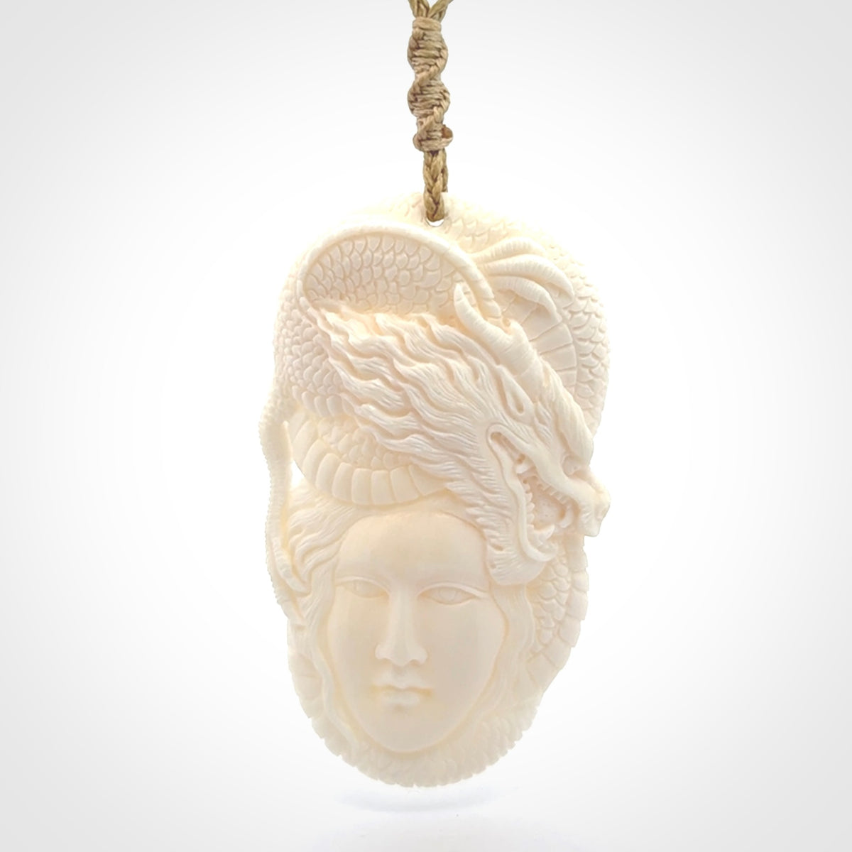 Hand carved bone woman dragon pendant