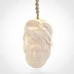 Hand carved bone woman dragon pendant