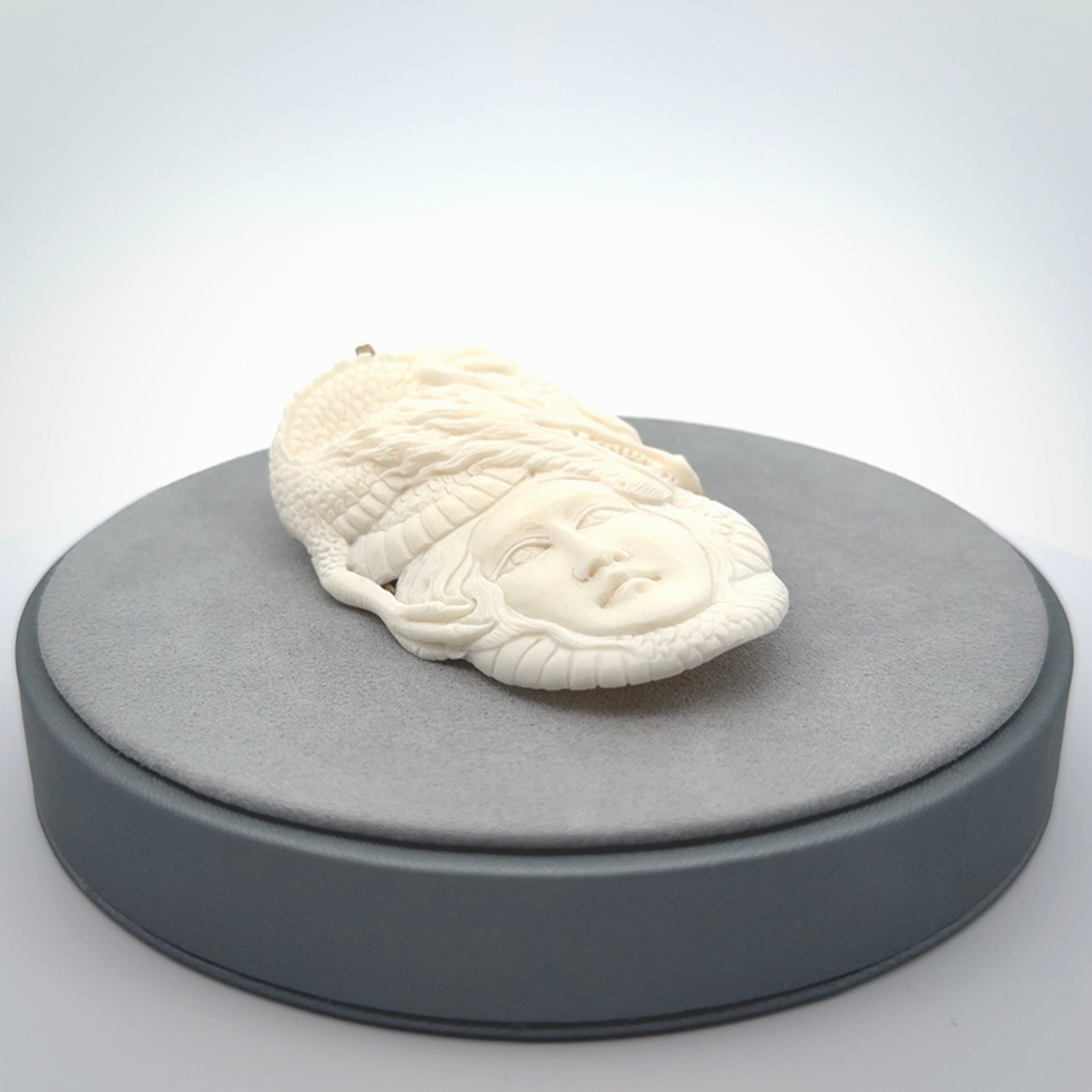 Hand carved bone woman dragon pendant