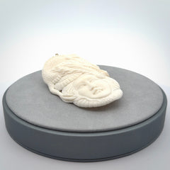 Hand carved bone woman dragon pendant
