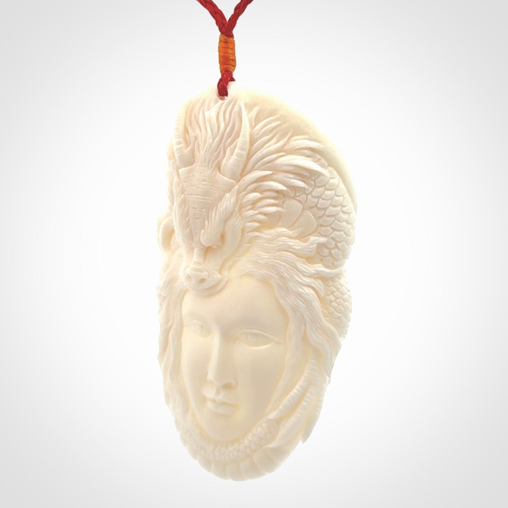 A Wonderful and Creative, Hand Carved Dragon Woman Pendant
