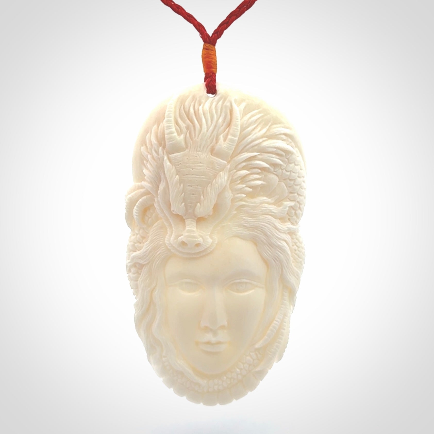 A Wonderful and Creative, Hand Carved Dragon Woman Pendant