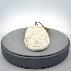 Hand Carved in Bone Dragon Woman Pendant