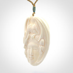 Hand Carved in Bone Dragon Woman Pendant