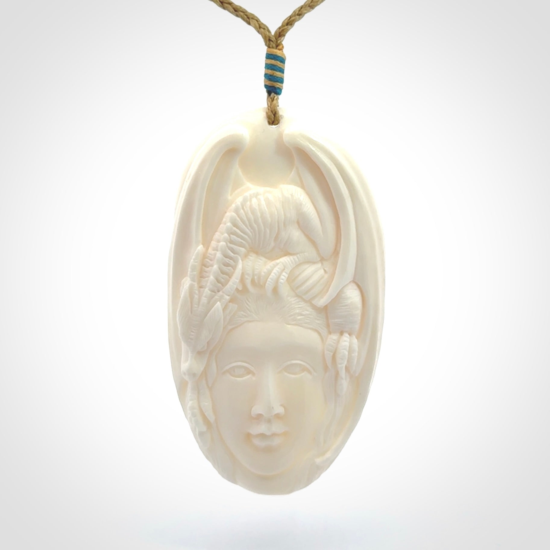 Hand Carved in Bone Dragon Woman Pendant