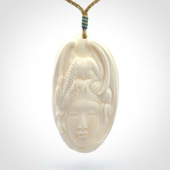 Hand Carved in Bone Dragon Woman Pendant