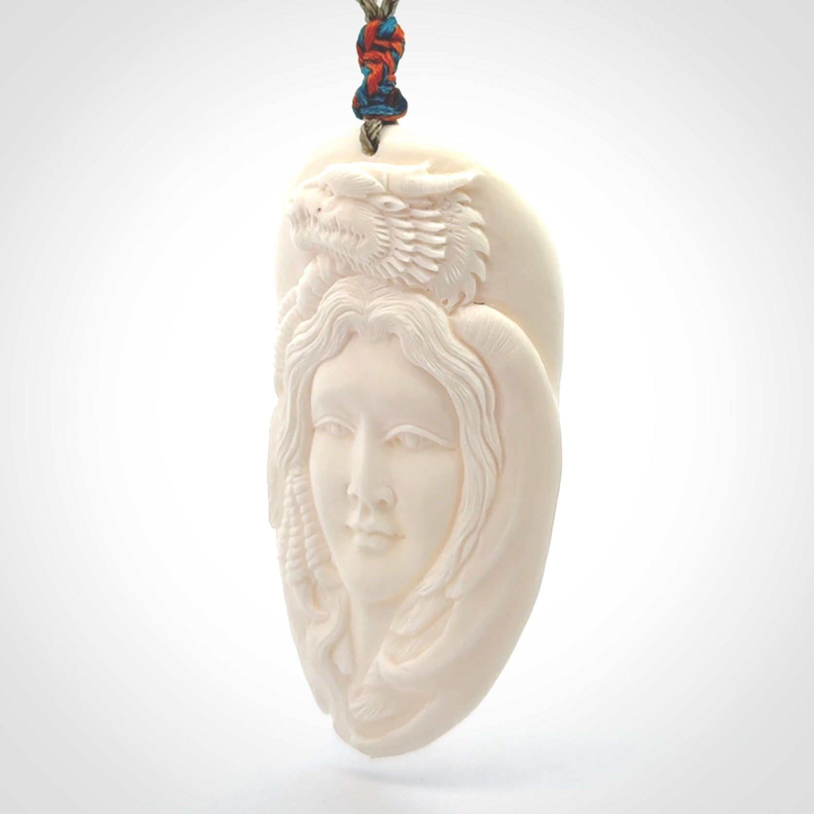Hand carved bone dragon woman pendant