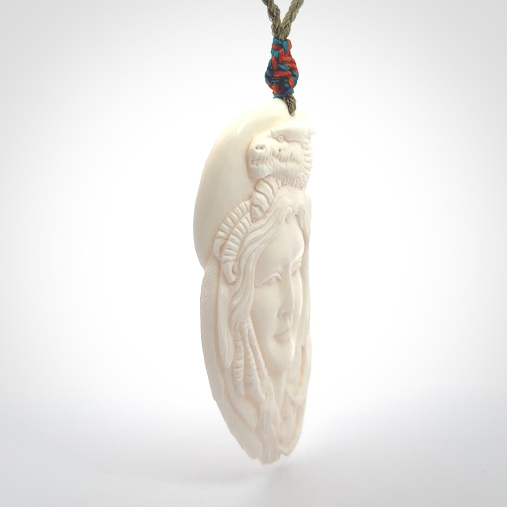 Hand carved bone dragon woman pendant