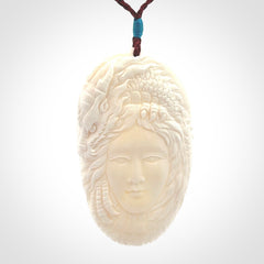 Hand carved bone dragon woman pendant
