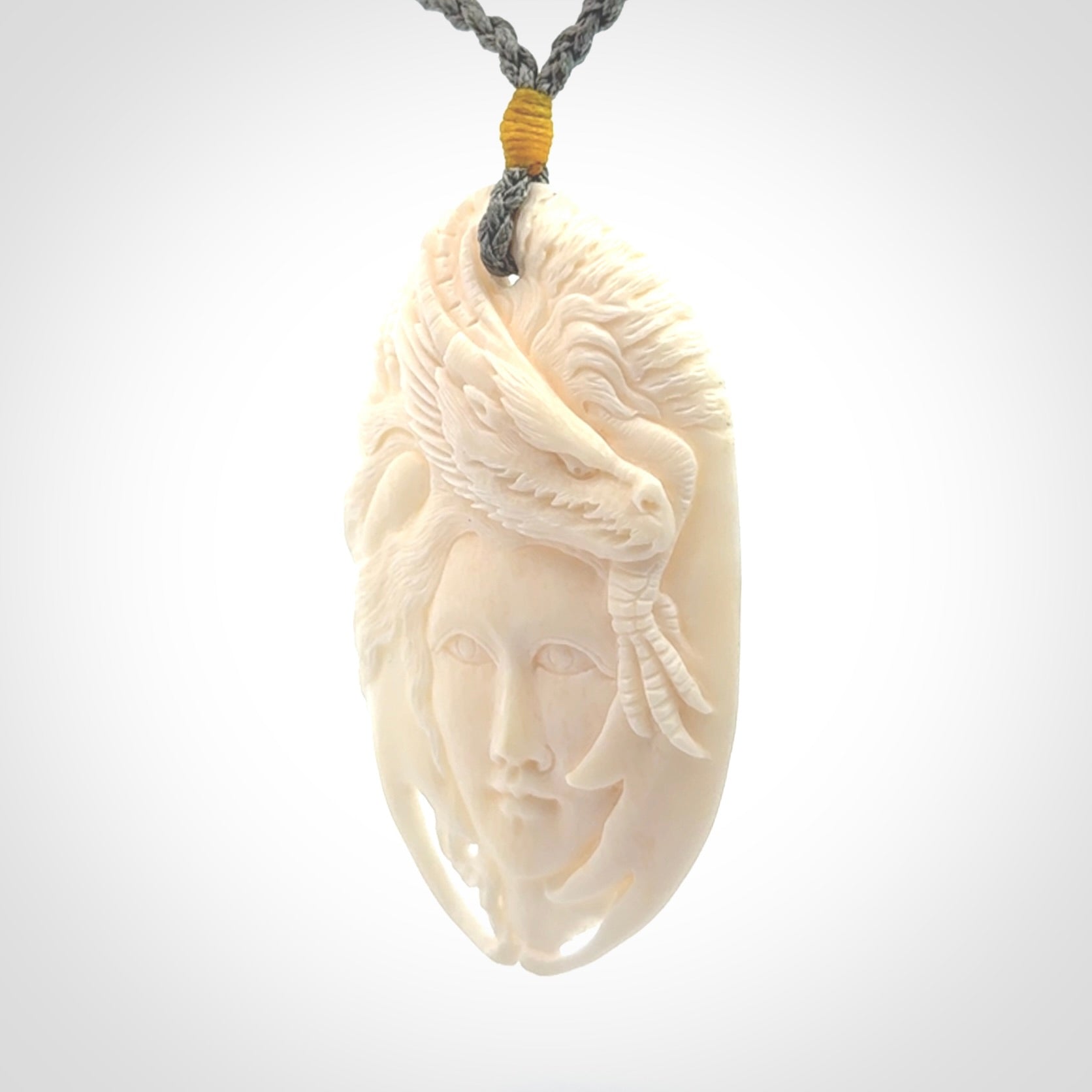 Hand carved bone dragon woman pendant