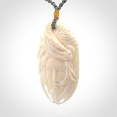 Hand carved bone dragon woman pendant