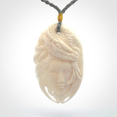 Hand carved bone dragon woman pendant