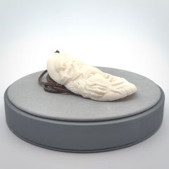 Hand carved bone dragon woman pendant