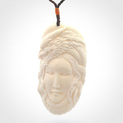 Hand carved bone dragon woman pendant