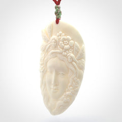 Fanciful and Creative Bone Art to Wear! Bone woman with fairies pendant
