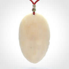 Fanciful and Creative Bone Art to Wear! Bone woman with fairies pendant