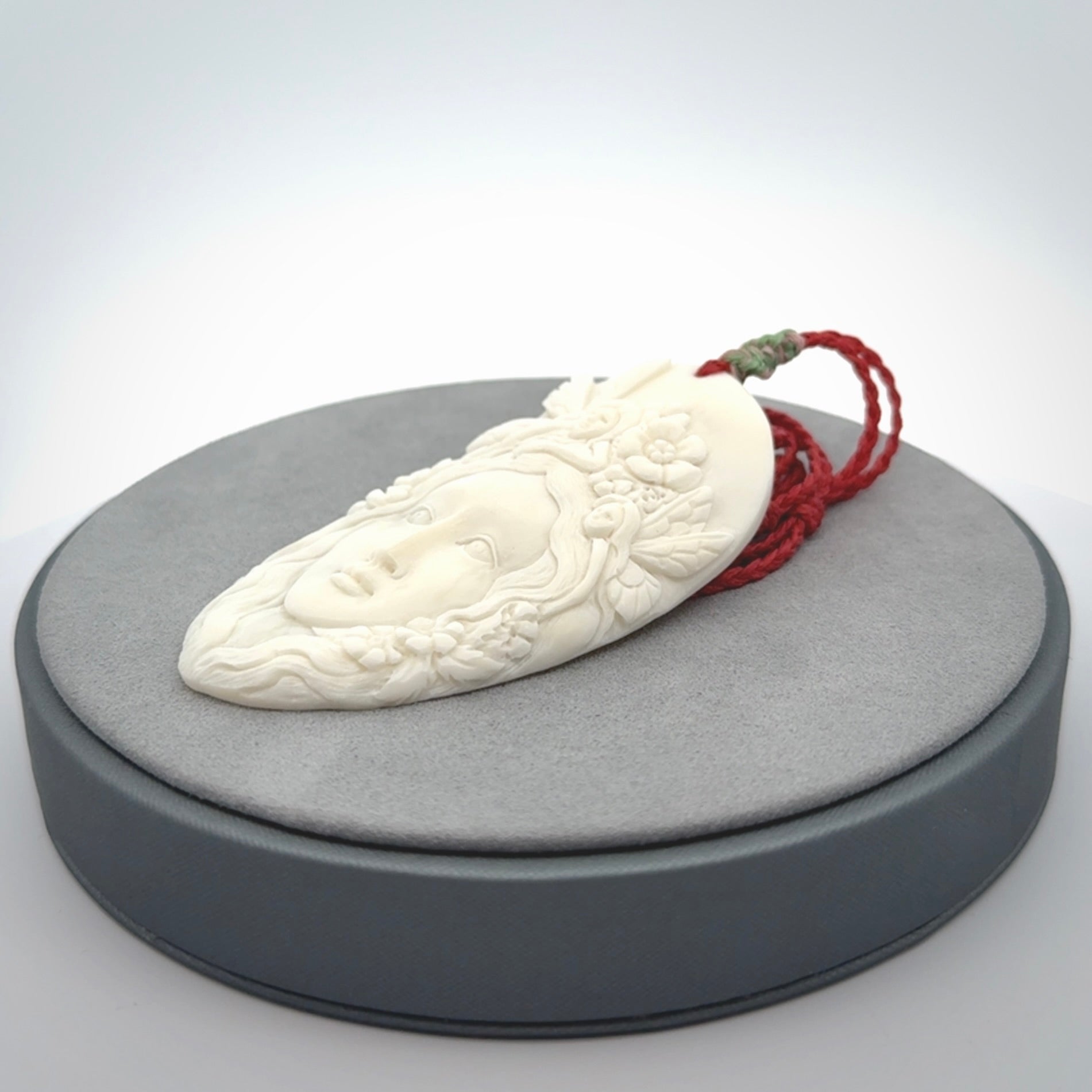 Fanciful and Creative Bone Art to Wear! Bone woman with fairies pendant