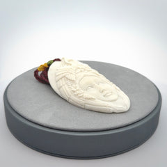 Hand Carved Woman with Peacock Pendant