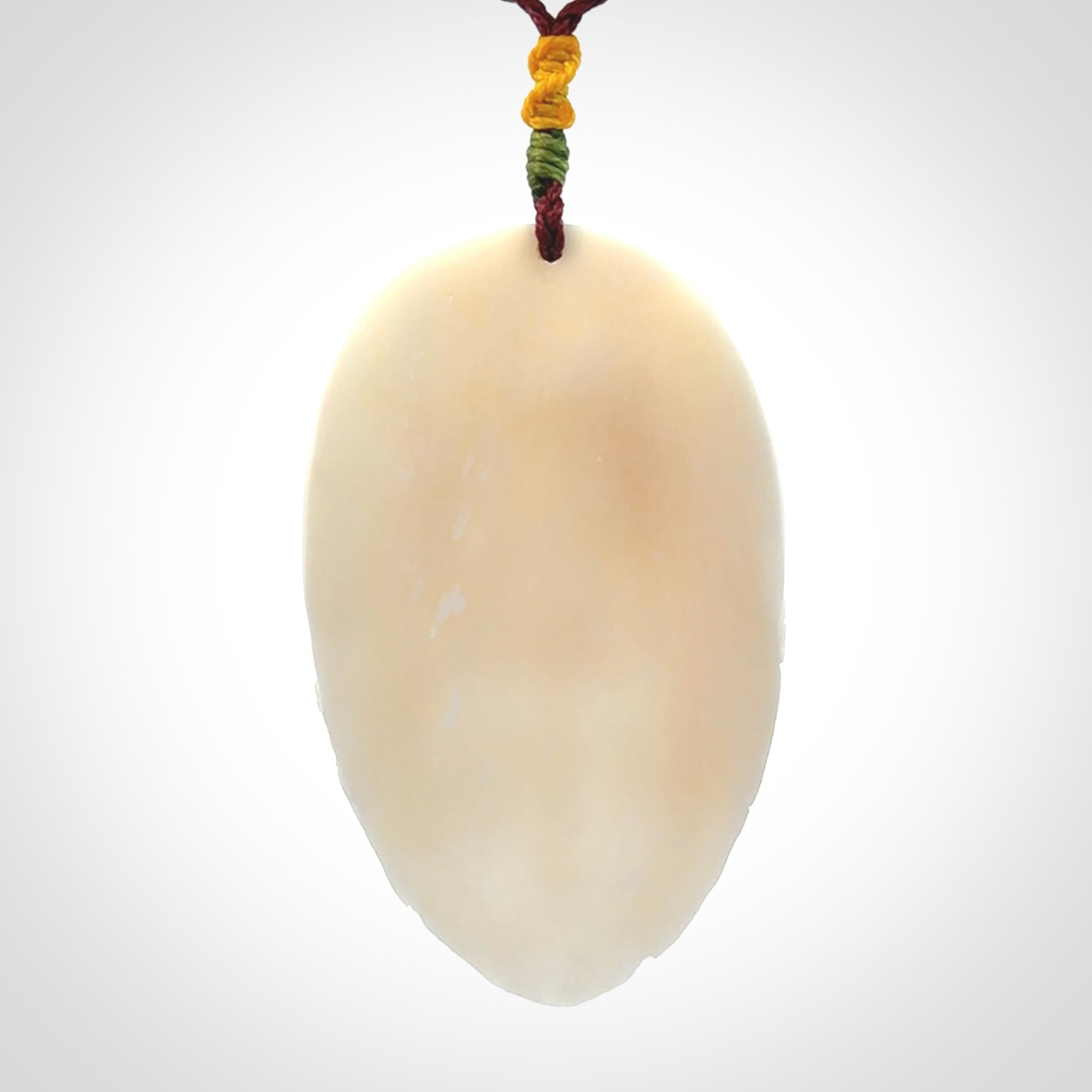 Hand Carved Woman with Peacock Pendant