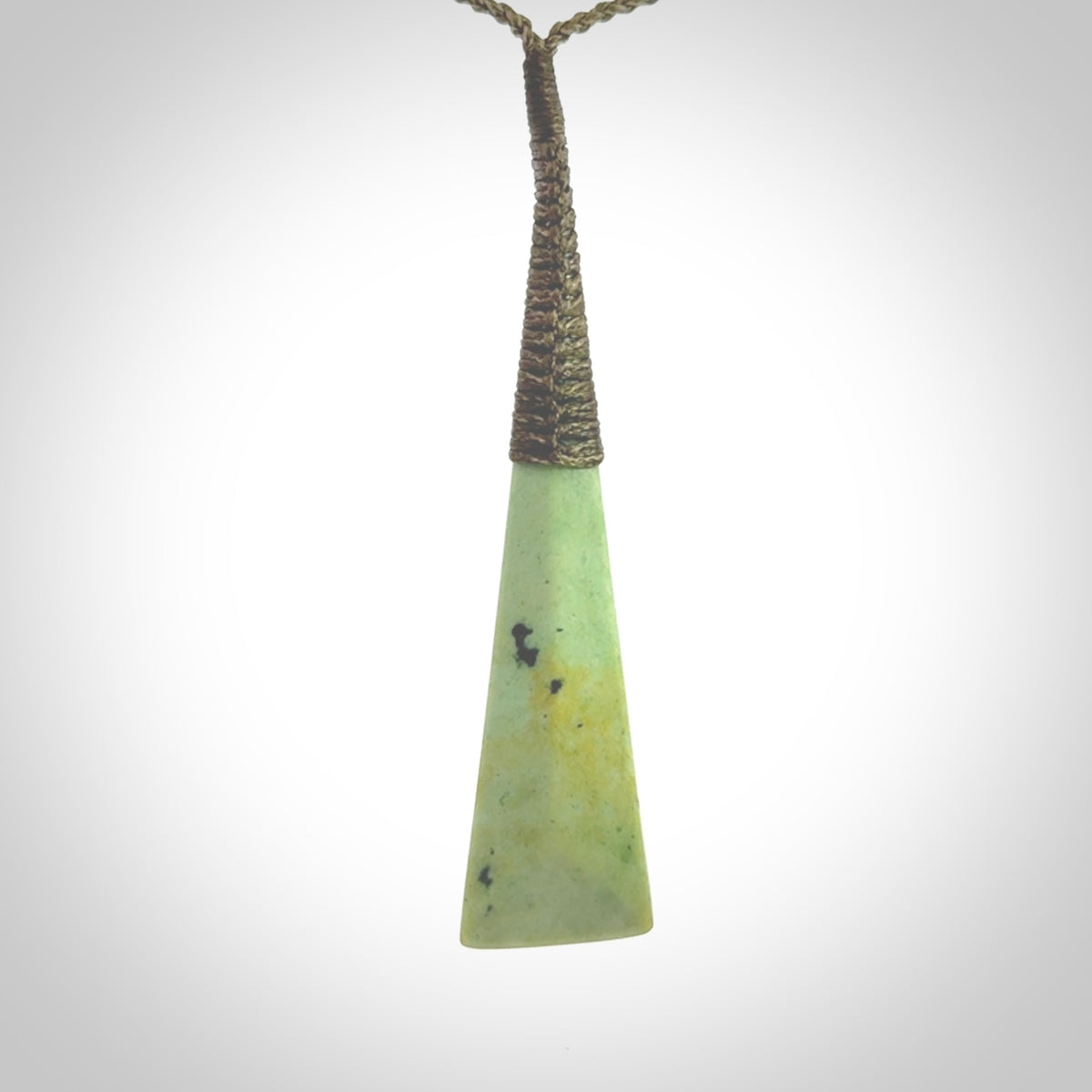 One only larger sized New Zealand jade drop pendant. Hand carved in New Zealand by Donna Summers, jade artist, for NZ Pacific. Provided with Khaki adjustable cord.