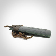 Hand made large New Zealand jade toki with koru pendant. Hand carved in New Zealand by Kerry Thompson. Unique large Jade Toki with adjustable cord.