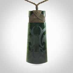 Hand made large New Zealand jade toki with koru pendant. Hand carved in New Zealand by Kerry Thompson. Unique large Jade Toki with adjustable cord.